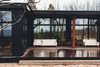 Modern home with Outdoor, Large Patio, Porch, Deck, Wood Patio, Porch, Deck, Front Yard, and Metal Patio, Porch, Deck. Exterior deck tucked between the master suite and the main home. Photo 2 of The Caudill House