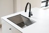 Modern home with Kitchen, Pendant Lighting, Engineered Quartz Counter, Undermount Sink, and Concrete Floor. TopZero sinks and drying racks come with each Hygge Supply kitchen island. Photo 12 of North Shore #7
