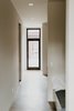 Modern home with Hallway and Concrete Floor. Entry door Photo 17 of North Shore #7