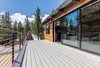 Modern home with Outdoor, Front Yard, Hardscapes, Decking Patio, Porch, Deck, Large Patio, Porch, Deck, Metal Fences, Wall, and Wood Patio, Porch, Deck. Deck off of kitchen/living with large multi-slide door Photo 3 of Mammoth Modern House 1
