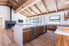 Modern home with Kitchen, Quartzite Counter, Engineered Quartz Counter, Wood Cabinet, Ceiling Lighting, Pendant Lighting, Dishwasher, Undermount Sink, and Medium Hardwood Floor. Dual dishdrawer units for holidays, large dinners, friends... Photo 8 of Mammoth Modern House 1