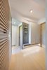 Modern home with Kitchen, Wood Cabinet, Marble Counter, Stone Tile Backsplashe, Limestone Floor, Ceramic Tile Floor, Wall Lighting, Ceiling Lighting, Floor Lighting, Track Lighting, Concrete Backsplashe, Concrete Floor, and Drop In Sink. www.adj.com.hk @studioadjective Photo 6 of Dragon's Range Studio Adjective HONG KONG