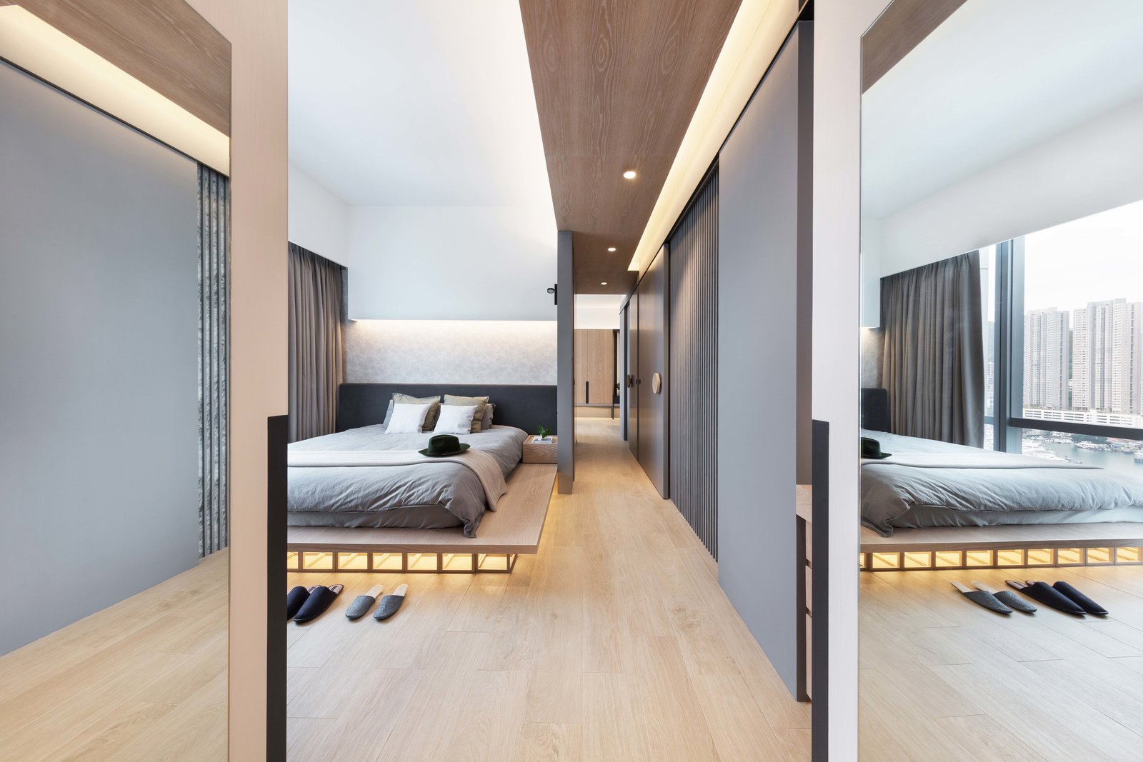 THE BEDROOM AND THE CORRIDOR
Studio Adjective newly residential project for a lovely couple at Larvotto, Aberdeen, Hong Kong.
At the southern side of Hong Kong, we have recently designed an apartment facing the Aberdeen Harbour with a beautiful mountain view. The apartment is designed to lengthen the horizontal experience with long timber cabinet wall and a mix of grey marble and texture wall, and introducing a airy flow to the interior that merges with the surrounding scenery.
For more information, please find us at : www.adj.com.hk
Instagram : @studioadjective