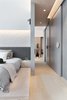 Modern home with Bedroom, Bed, Track Lighting, Chair, Bench, Ceiling Lighting, Wall Lighting, Shelves, and Floor Lighting. The Bedroom & Corridor
At the southern side of Hong Kong, we have recently designed an apartment facing the Aberdeen Harbour with a beautiful mountain view. The apartment is designed to lengthen the horizontal experience with long timber cabinet wall and a mix of grey marble and texture wall, and introducing a airy flow to the interior that merges with the surrounding scenery.
www.adj.com.hk
Instagram : @Studioadjective Photo 2 of Larvotto Studio Adjective HONG KONG