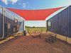 Modern home with Exterior, Metal Roof Material, Metal Siding Material, and House. Our Flophouze exteriors are simply stunning Photo 2 of Flophouze Hotel