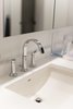 Modern home with Bath Room, Quartzite Counter, Engineered Quartz Counter, and Wall Mount Sink. Sea Star Master Bathroom - After Photo 7 of Sea Star Master Bathroom - Hidden Potential