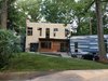 Modern home with Exterior, House Building Type, Wood Siding Material, and Concrete Siding Material. From the street Photo 6 of The Joseph House