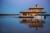Modern home with Exterior, House Building Type, Metal Roof Material, and Wood Siding Material. Port Elevation Photo 4 of The Barge Yacht