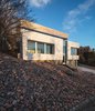 Modern home with Exterior, Wood Siding Material, House Building Type, and Flat RoofLine. Exterior Perspective Photo 3 of Webster Terrace