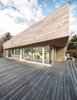 Modern home with Exterior, House Building Type, Wood Siding Material, and Flat RoofLine. Rooftop Patio Photo 4 of Webster Terrace