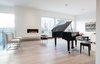 Modern home with Living Room, Bench, Chair, Sofa, Ceiling Lighting, Light Hardwood Floor, and Gas Burning Fireplace. Living Room Photo 7 of Webster Terrace