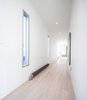 Modern home with Hallway and Light Hardwood Floor. Gallery Space Photo 9 of Webster Terrace