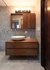 Modern home with Bath Room, Wood Counter, Porcelain Tile Floor, Wall Lighting, Porcelain Tile Wall, and Vessel Sink. Bathroom Photo 3 of Stuyvesant Townhouse