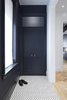 Modern home with Doors, Wood, Interior, and Swing Door Type. The entrance to the (re) Edwardian House Photo of (re) Edwardian House by Post Architecture Inc.