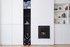 Modern home with Living Room and Gas Burning Fireplace. Millwork in the Living Space Photo 7 of (re) Edwardian House by Post Architecture Inc.