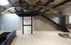 Modern home with Living Room, Ceiling Lighting, Recessed Lighting, and Light Hardwood Floor. living with iron and glass cantilevered mezzanine Photo of CAFElab architects turns an old farmhouse into a luxury residence in Rome