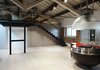 Modern home with Kitchen, Engineered Quartz Counter, Light Hardwood Floor, Ceiling Lighting, Accent Lighting, Refrigerator, and Recessed Lighting. Living with the sculptural kitchen Photo 2 of CAFElab architects turns an old farmhouse into a luxury residence in Rome