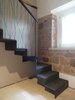 Modern home with Staircase, Metal Tread, Metal Railing, and Cable Railing. detail of the staicase in bent sheet metal and cordura Photo 9 of CAFElab architects turns an old farmhouse into a luxury residence in Rome