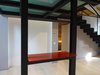 Modern home with Living Room, Bar, and Light Hardwood Floor. Living, detail fo the little bar under the cantilevered mezzanine Photo 7 of CAFElab architects turns an old farmhouse into a luxury residence in Rome