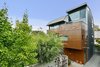 Modern home with Exterior, House Building Type, Metal Roof Material, Wood Siding Material, Metal Siding Material, and Glass Siding Material. Exterior, day Photo 2 of The Rempel Temple