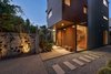 Modern home with Exterior, House Building Type, Metal Roof Material, Wood Siding Material, Metal Siding Material, and Glass Siding Material. Exterior entry Photo 3 of The Rempel Temple