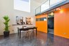 Modern home with Office, Craft Room Room Type, and Concrete Floor. Level 1 workspace (b) Photo 7 of The Rempel Temple