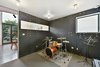 Modern home with Bedroom, Concrete Floor, and Ceiling Lighting. Level 1 music studio Photo 10 of The Rempel Temple