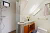 Modern home with Concrete Floor and Ceiling Lighting. Level 1 full bath Photo 14 of The Rempel Temple