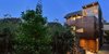 Modern home with Exterior, House Building Type, Metal Roof Material, Metal Siding Material, and Wood Siding Material. Exterior, night Photo of The Rempel Temple