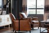 Modern home with Living Room, Chair, End Tables, Coffee Tables, Media Cabinet, and Stools. A pair of Martini tables, Restoration Hardware Photo 9 of Eastern Columbia Loft