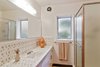 Modern home with Bath Room, Tile Counter, Undermount Sink, and Enclosed Shower. One of the bathrooms with starburst tilework, that the homeowner says is original with the home Photo 9 of Vintage Hollywood in the Berkeley Hills