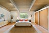 Modern home with Bedroom, Track Lighting, and Light Hardwood Floor. Lofty master bedroom suite Photo 12 of Vintage Hollywood in the Berkeley Hills