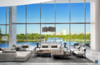 Modern home with Living Room, End Tables, Coffee Tables, Table Lighting, Chair, Floor Lighting, Sofa, and Sectional. Photo Courtesy of RIVA Residences Photo 2 of RIVA Residences River Loft Penthouse