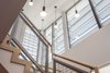 Modern home with Staircase, Wood Tread, Wood Railing, and Metal Railing. stair to 2nd floor Photo 5 of Legal House