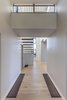 Modern home with Hallway and Light Hardwood Floor. 2nd floor hallway Photo 6 of Legal House