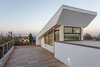 Modern home with Exterior and House Building Type. roof deck Photo 10 of Legal House