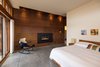 Modern home with Bedroom, Bed, Dresser, Accent Lighting, Recessed Lighting, and Concrete Floor. Master Suite Photo 7 of High Desert Pavillion