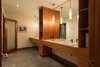 Modern home with Bath Room, Engineered Quartz Counter, Concrete Floor, Drop In Sink, Pendant Lighting, and Ceiling Lighting. Bath 2 Photo 9 of High Desert Pavillion