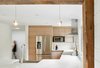 Modern home with Kitchen, Wood Counter, Wood Cabinet, and Pendant Lighting. View of Kitchen. Photo 2 of Hockley Valley Chalet Renovation