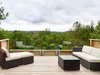 Modern home with Outdoor, Rooftop, Trees, Wood Patio, Porch, Deck, and Decking Patio, Porch, Deck. View looking over hills from deck. Photo 7 of Hockley Valley Chalet Renovation