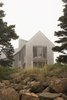 Modern home with Exterior, House Building Type, Shingles Roof Material, Wood Siding Material, and Gable RoofLine. South end (living room, master bedroom) of the building on a typical foggy day Photo of Deep Cove House