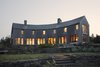 Modern home with Exterior, Shingles Roof Material, House Building Type, Wood Siding Material, and Gable RoofLine. Southwest faceted facade from garden Photo 16 of Deep Cove House