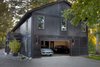 Modern home with Exterior, House Building Type, Shingles Roof Material, Wood Siding Material, and Gable RoofLine. car lovers willing to spend more than an extra buck or two to ensure that their favorite set of wheels never leaves their sight. Photo 20 of Bentley Longhouse