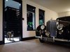 Modern home with Garage and Attached Garage Room Type. Showcase Parking Photo of Bentley Longhouse
