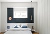 Modern home with Bed, Dresser, Bookcase, Chair, Storage, Pendant Lighting, Wall Lighting, Ceiling Lighting, and Medium Hardwood Floor. Master bed room Photo 13 of Colorfull in the white city
