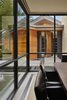 Modern home with Doors, Wood, Interior, Swing Door Type, and Metal. Formal dining room view to the main entry / front door. Photo 18 of Bent Tree Residence