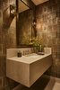 Modern home with Bath Room, Porcelain Tile Floor, Undermount Sink, Wall Lighting, and Marble Counter. Guest bathroom. Photo 13 of Bent Tree Residence