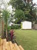 Modern home with Outdoor, Back Yard, Grass, Gardens, Flowers, and Trees. Back Yard and Shed Photo 14 of The Gilmore House