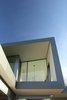 Modern home with Exterior, House Building Type, Wood Siding Material, Metal Siding Material, Flat RoofLine, and Shed RoofLine. Front entry Photo 4 of The Edge House