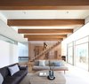 Modern home with Living Room, Sofa, Coffee Tables, Ceiling Lighting, and Light Hardwood Floor. Living room Photo 6 of The Edge House